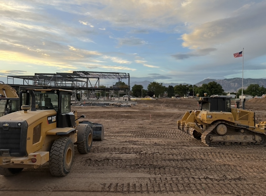 the process of the roosevelt rebuild- there is an excavator and the new beginning of the building