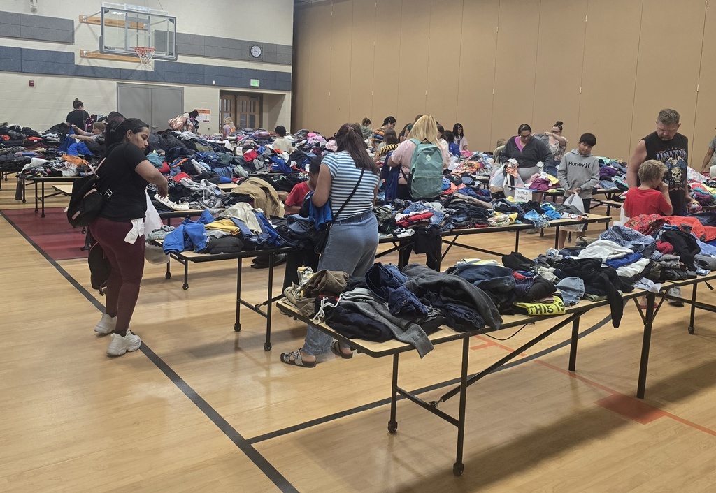 Families choosing clothing items