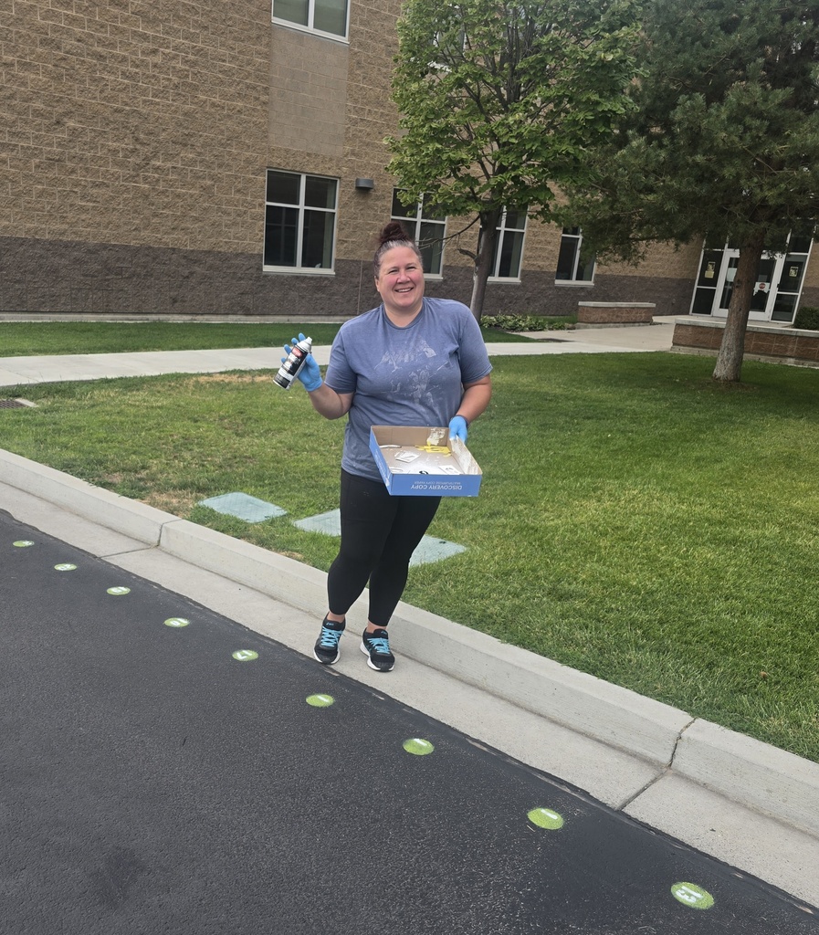 Custodian with spray paint