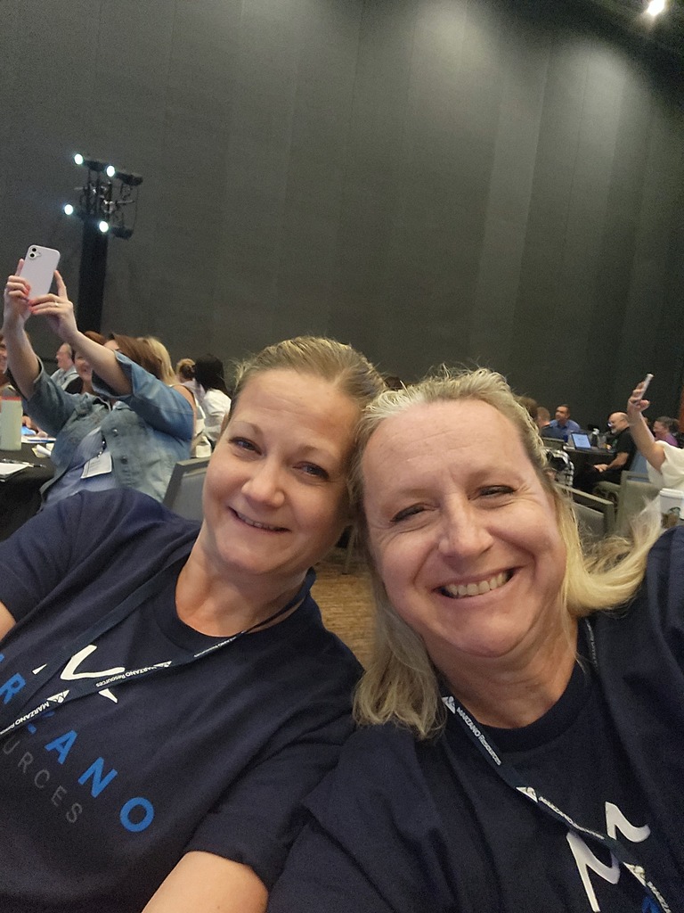 Two teachers at the teacher conference