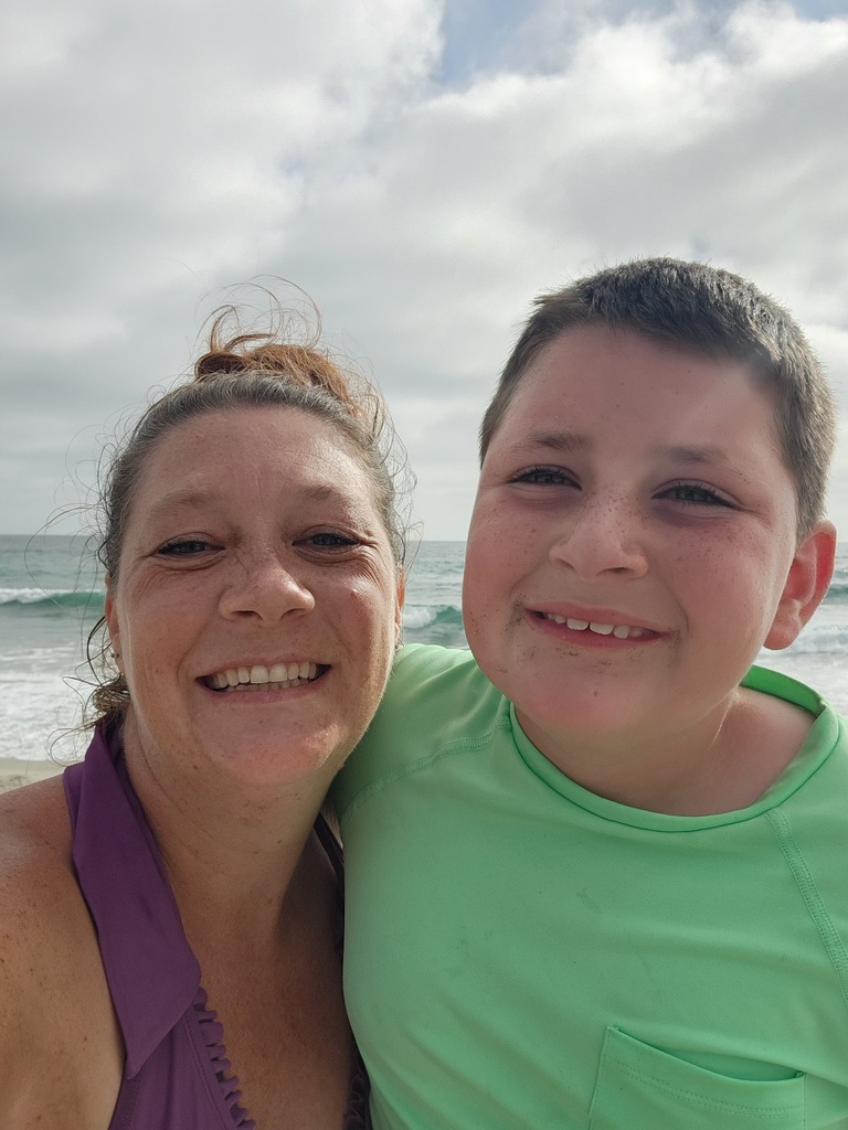 Ms. Smith with son at the beach