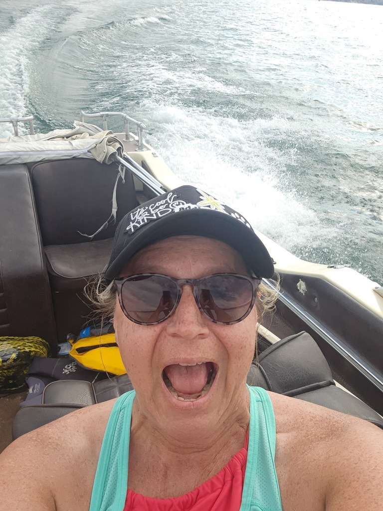 Mrs. Bingham on a boat