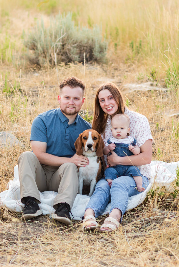 Mrs. Roberts with her husband, son and dog