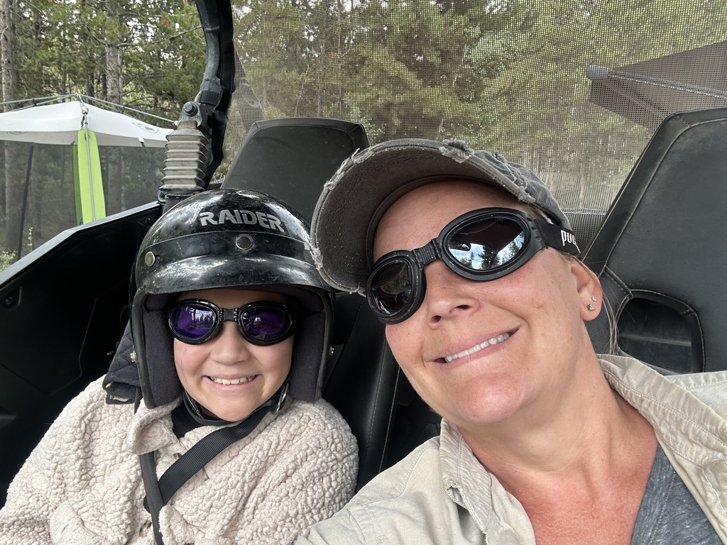 Mrs. Taurone off roading with grandchild