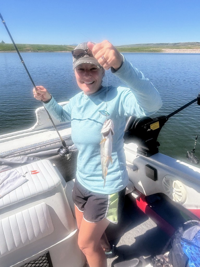 Mrs. Kenny catching a fish