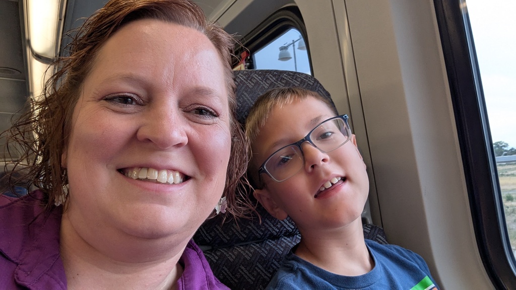 Ms. Olsen and son on trax