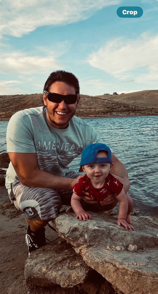 Mr. Warren and son at the beach