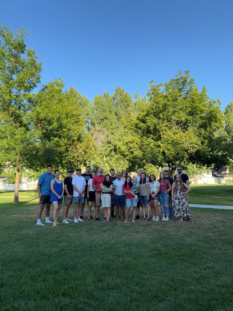Mrs. Atkinson and family in a park