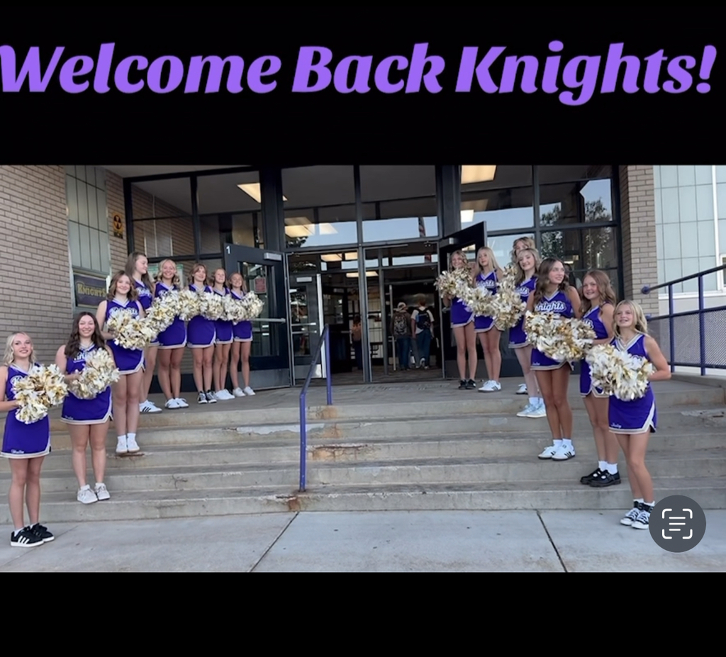 cheerleaders welcoming students on the first day 
