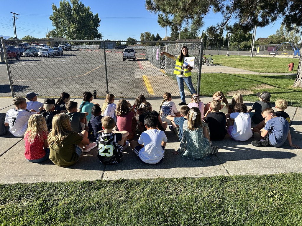 Pictures of students learning about parking safety