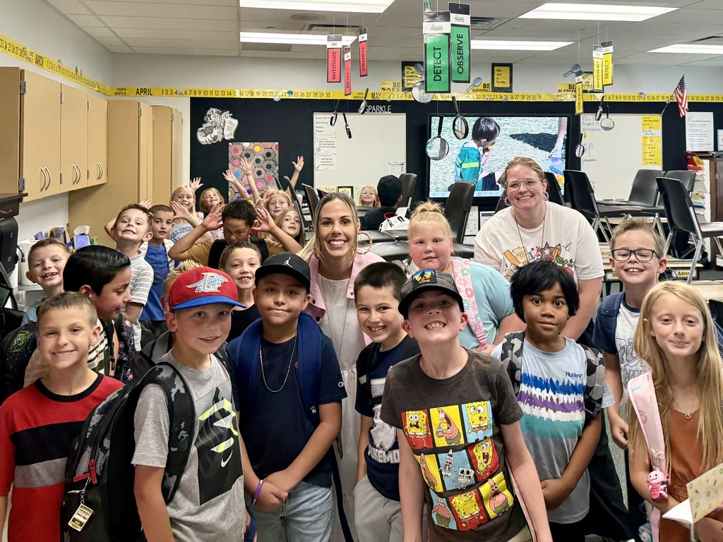 Students in classroom getting ready to leave