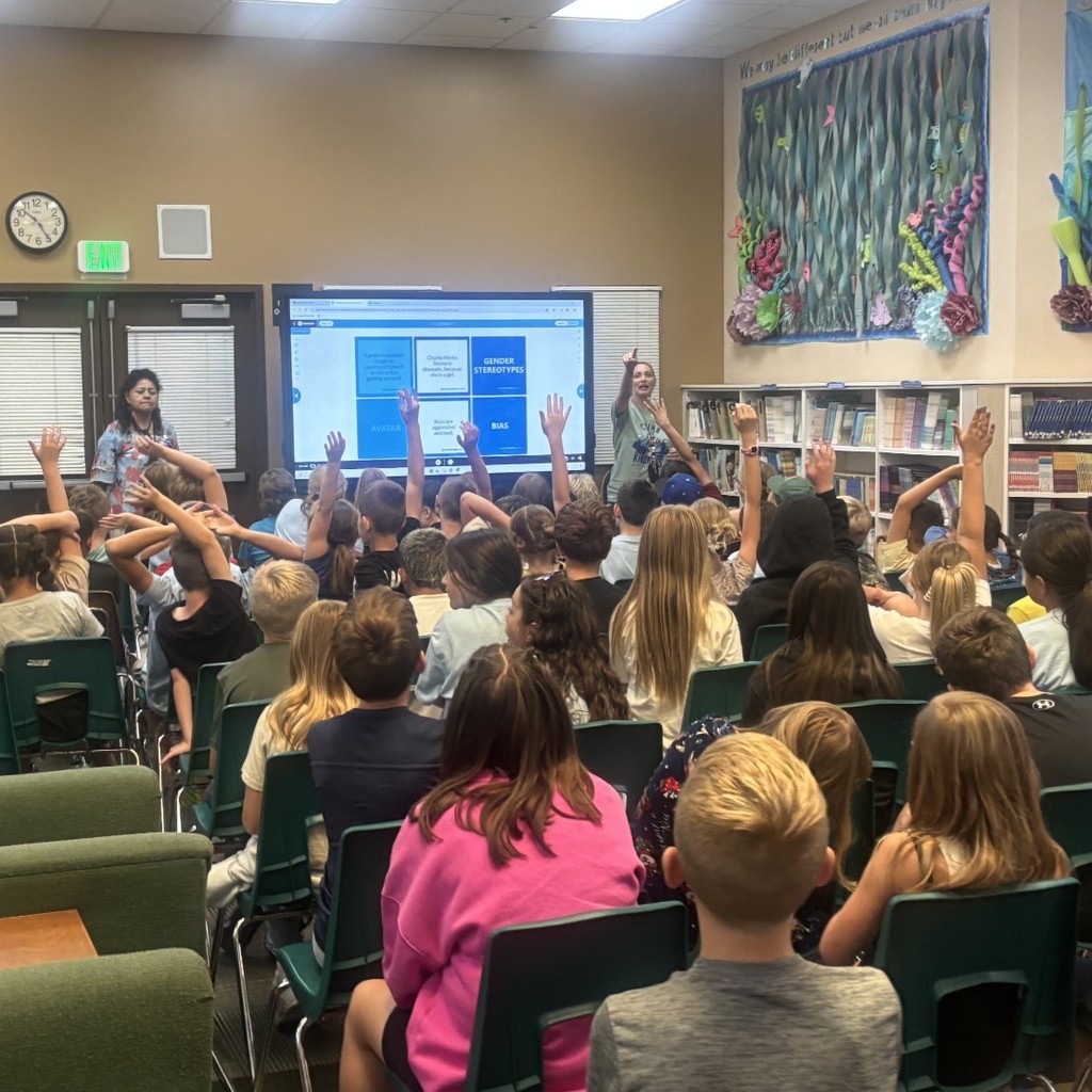 students learning in school library