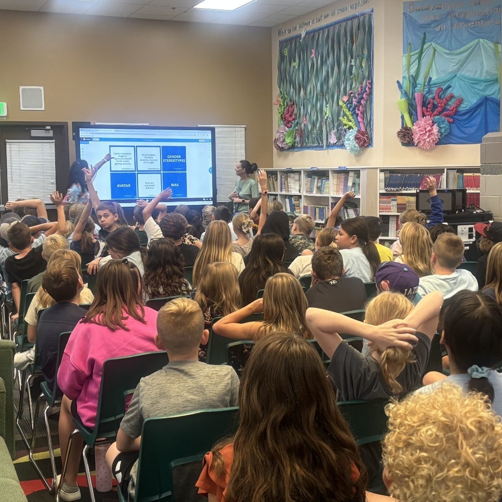students learning in school library