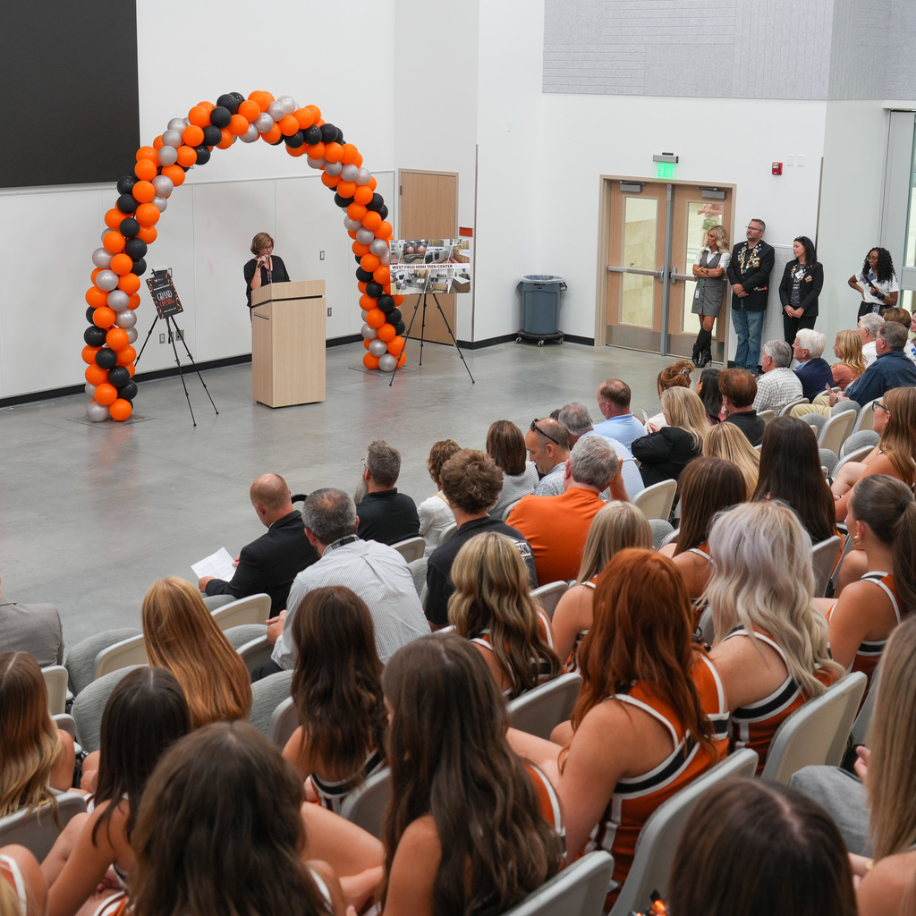 Teen center ribbon cutting crowd
