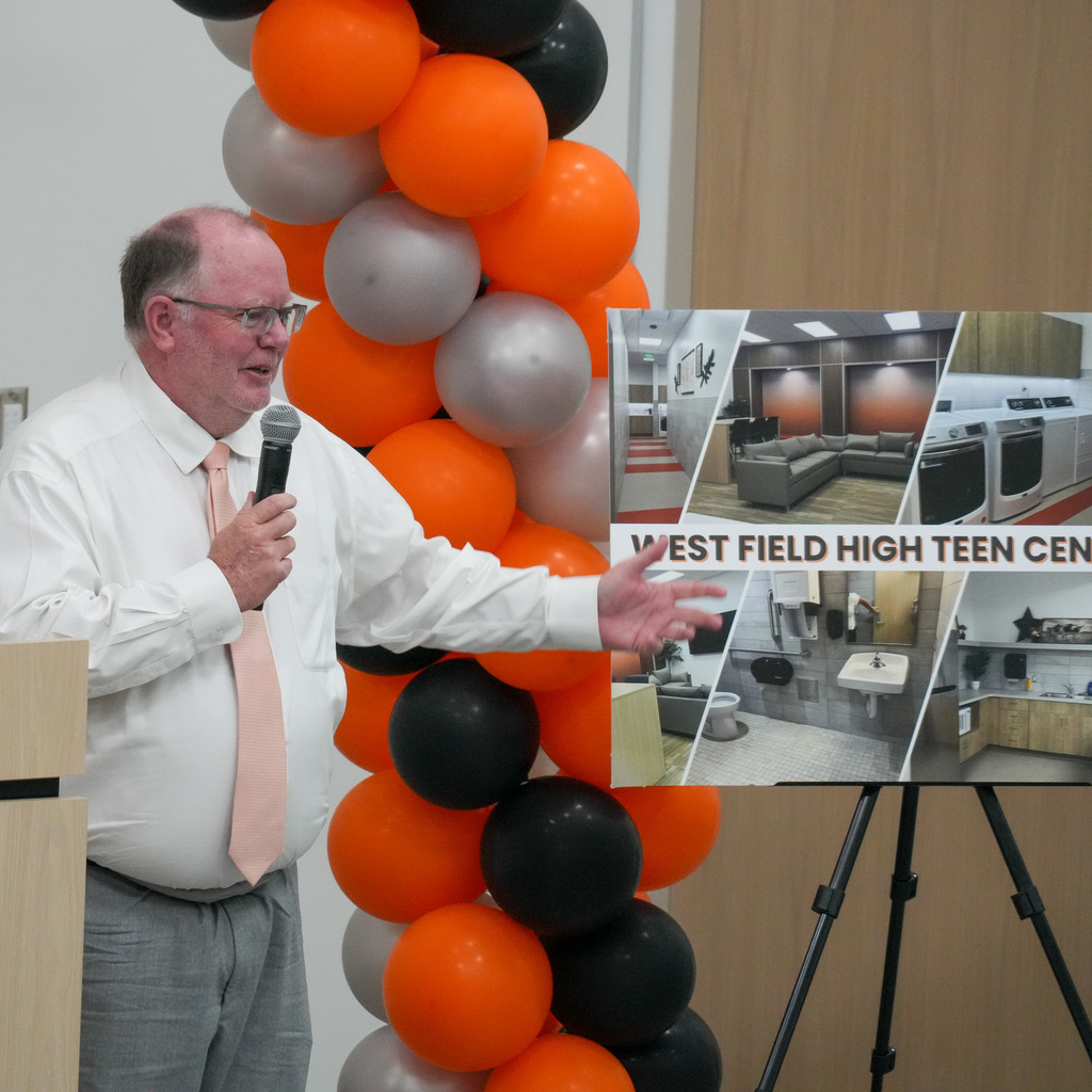 Teen center ribbon cutting speaker