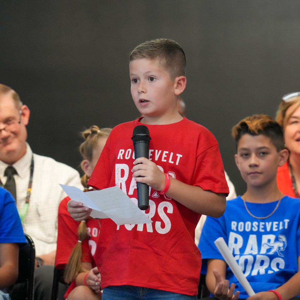 Roosevelt ribbon cutting ceremony students.