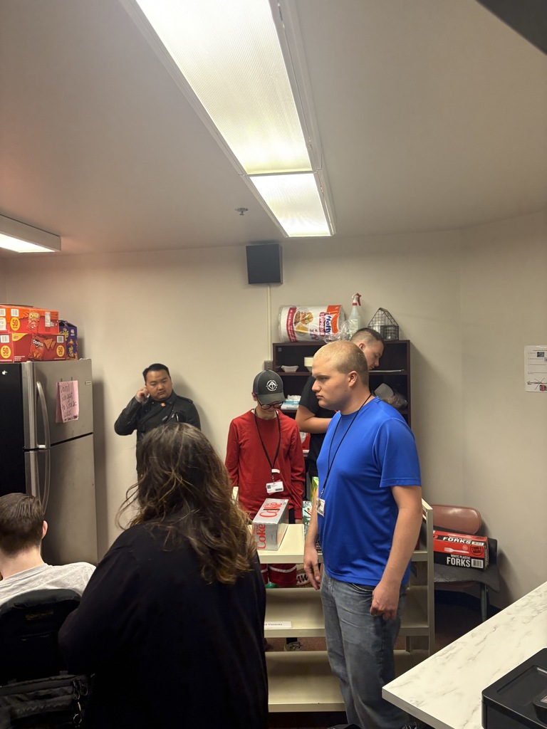 Students getting the school store ready.