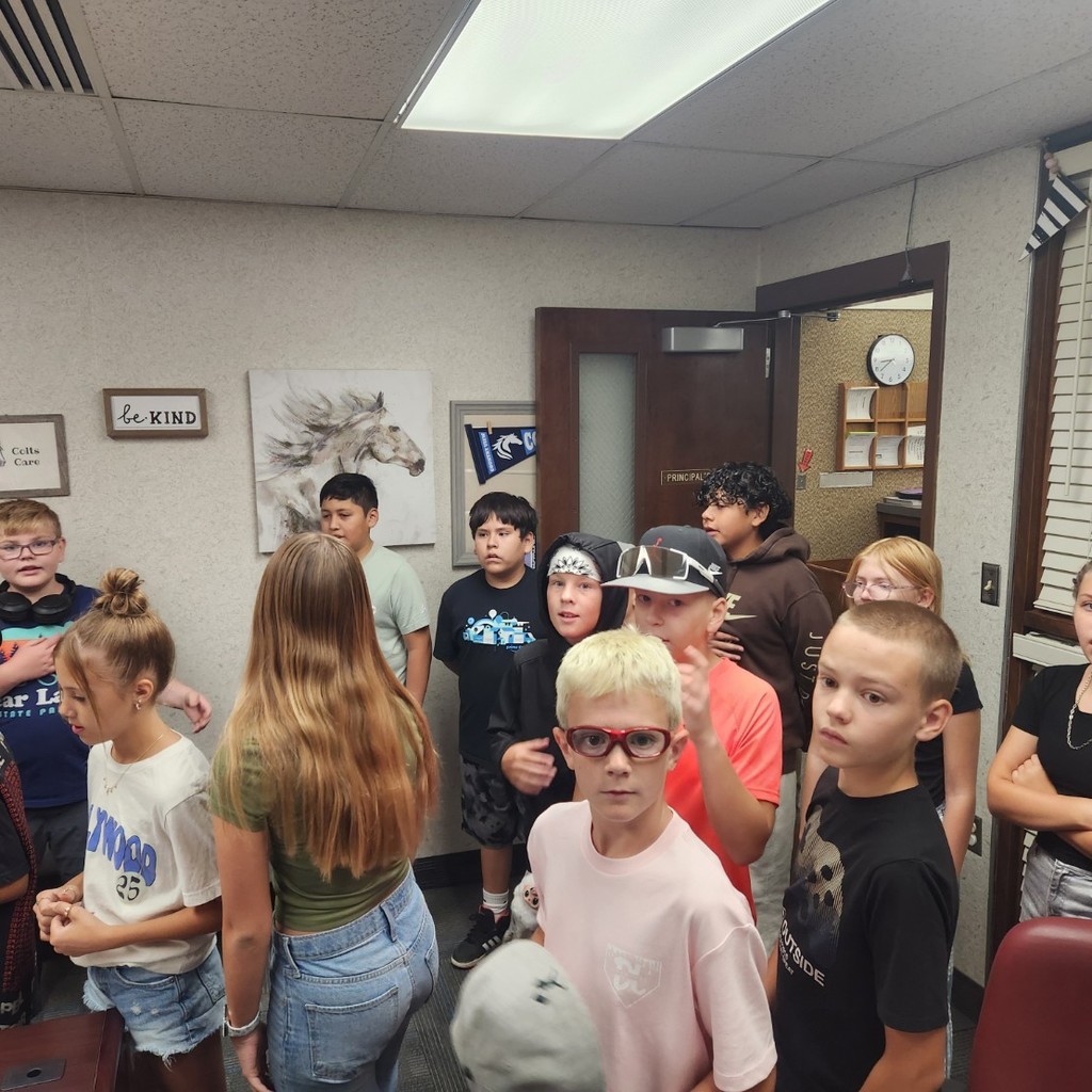 students doing morning announcements