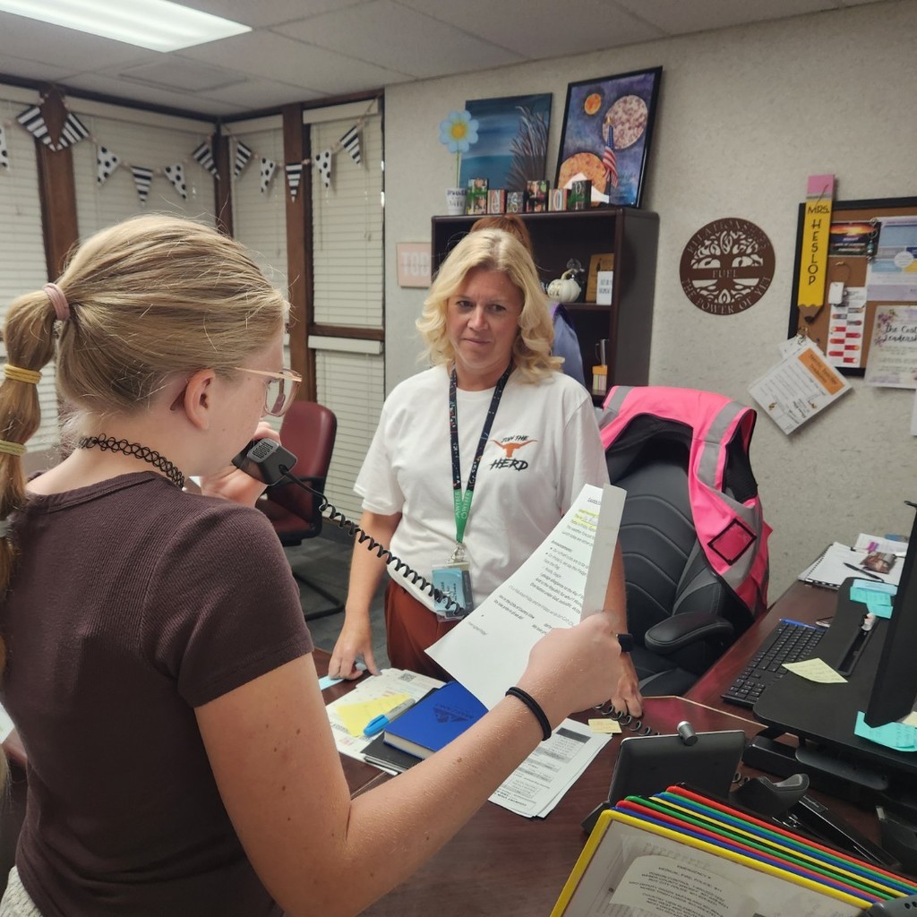 students doing morning announcements