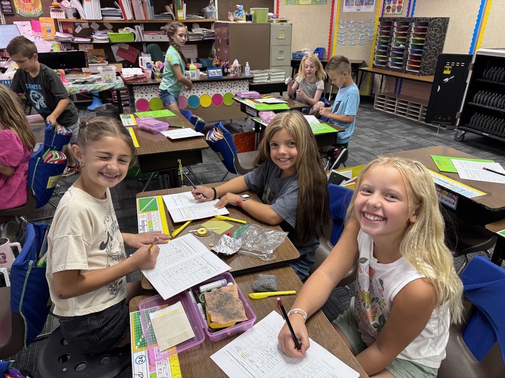 3rd graders exploring with magnets