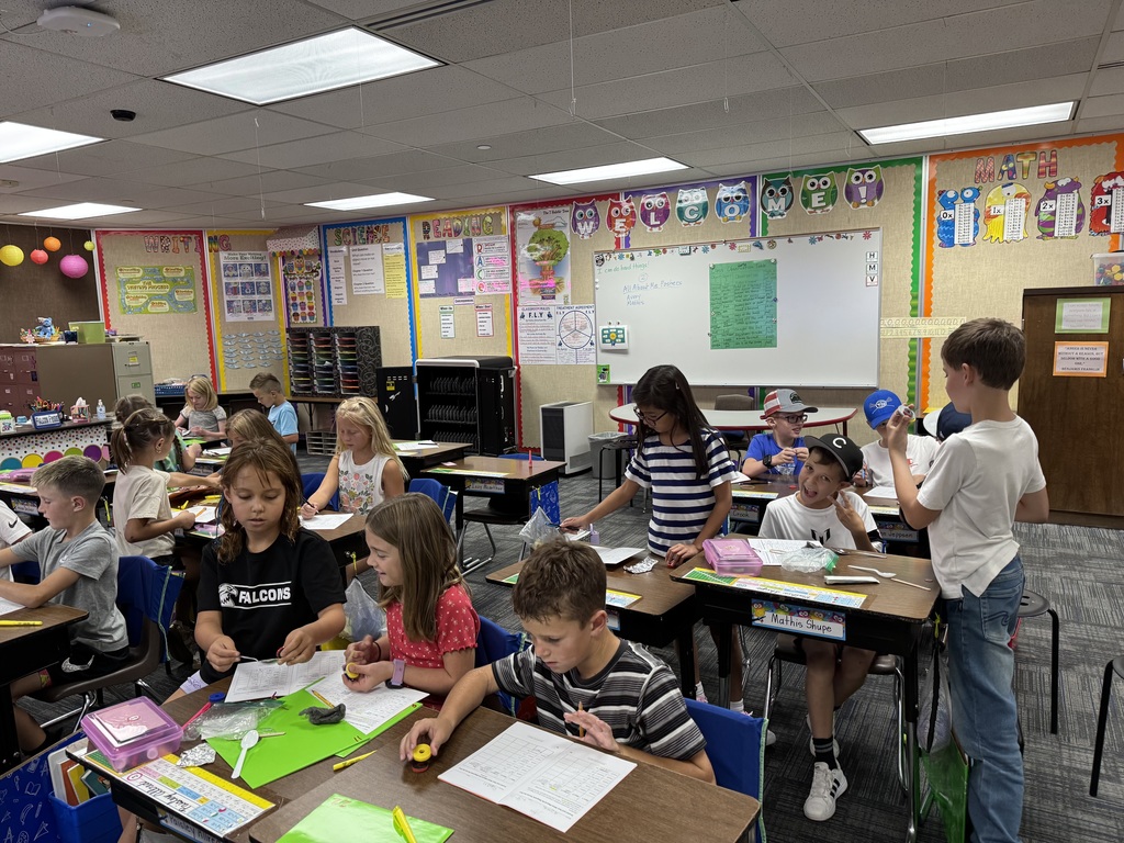 3rd graders exploring with magnets