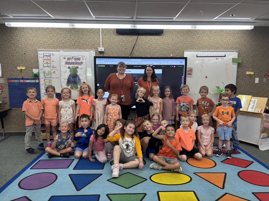 5th grade wearing orange to support kindergarteners
