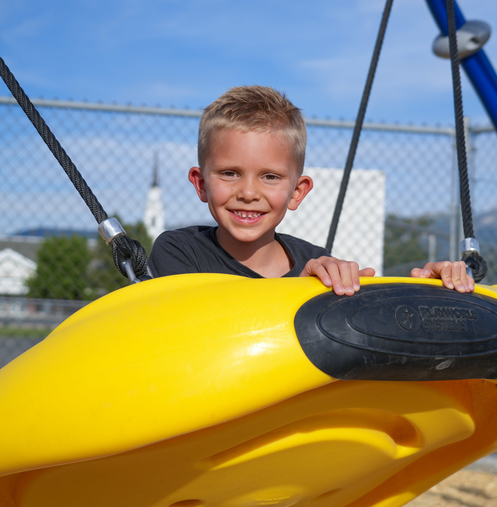 Students playing on new playground.