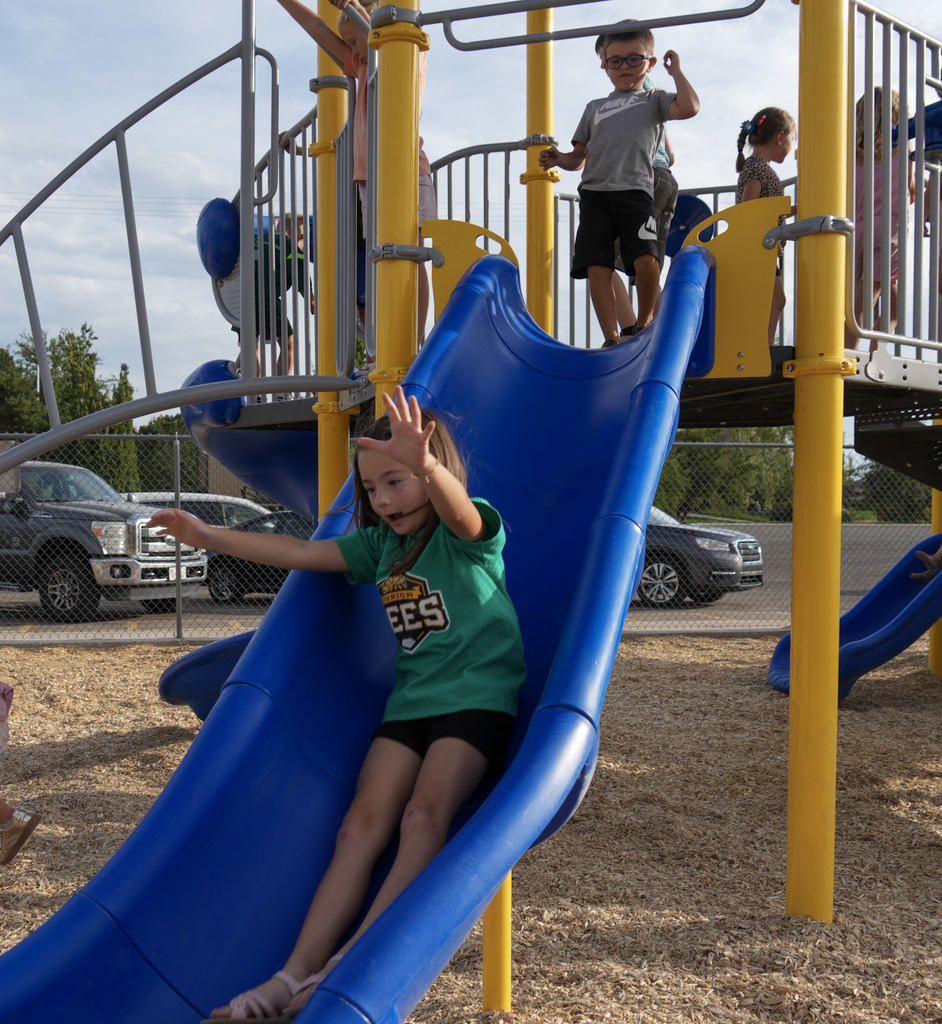 Students playing on new playground.