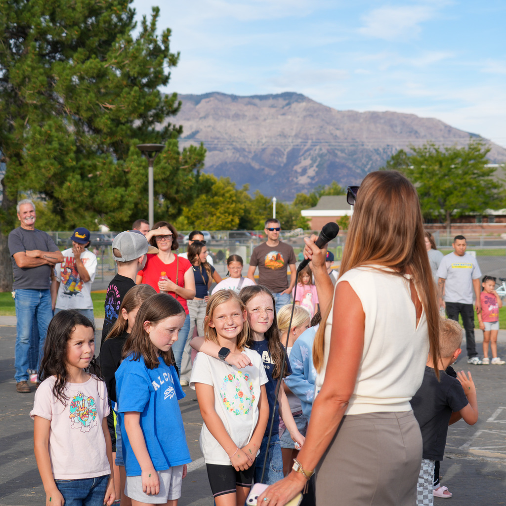 Parents and students gather for ceremony.