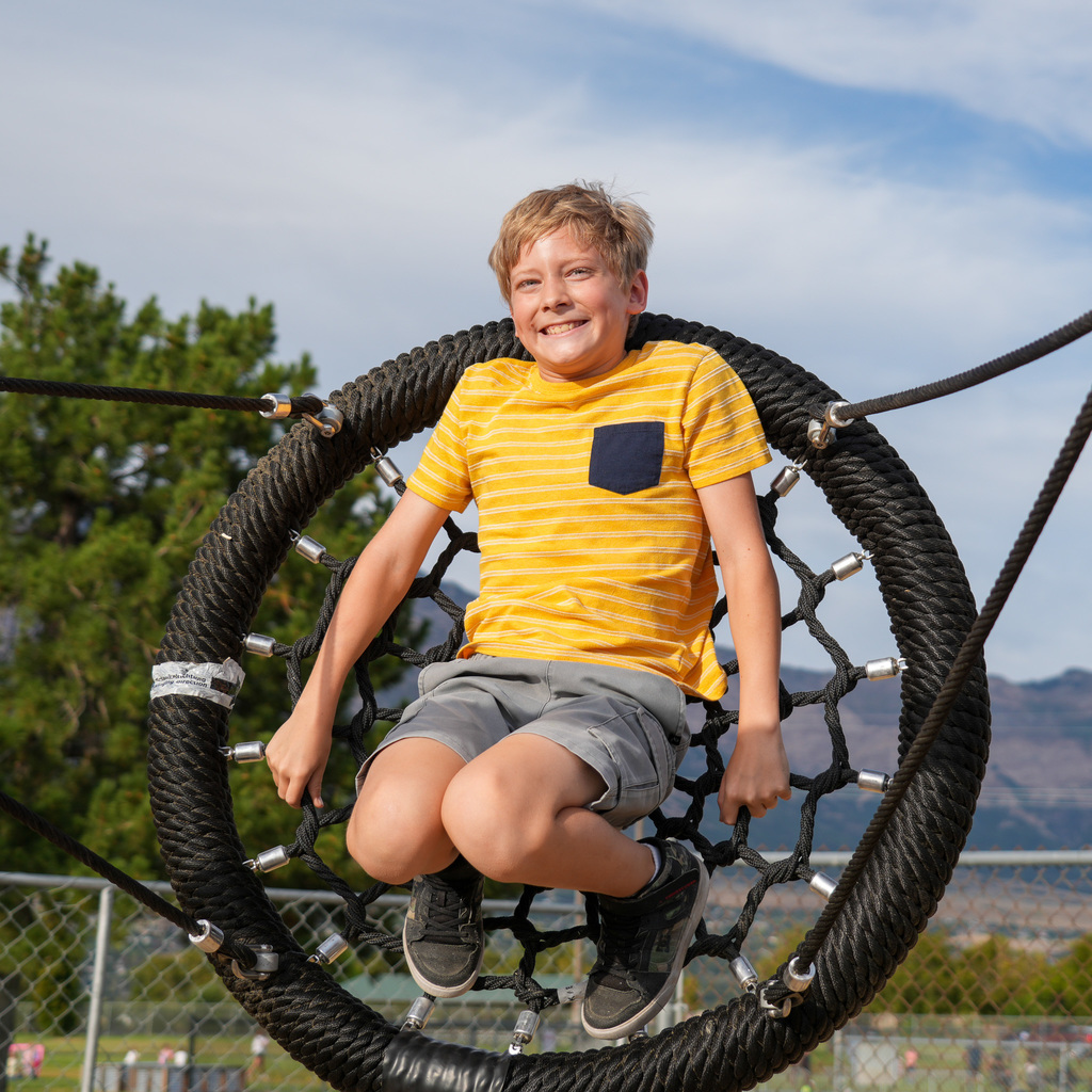 Students playing on new playground.