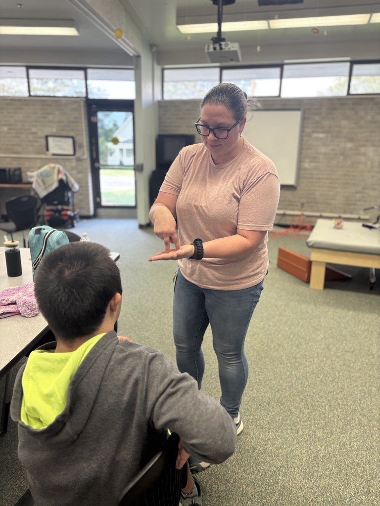 Kayleen working with student