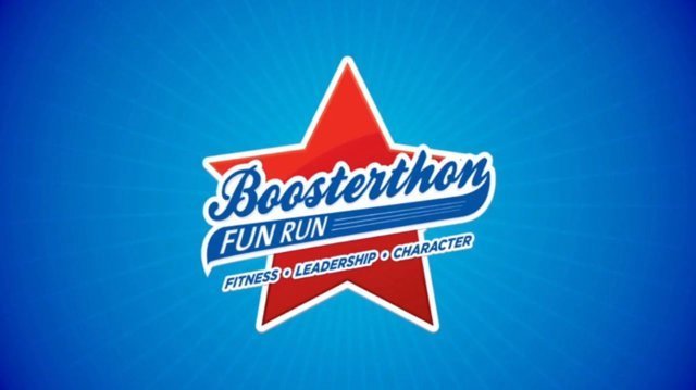 Logo for "Boosterthon Fun Run" featuring a large red star in the background with a blue and white banner overlay. The text on the banner reads "Boosterthon Fun Run" and below it, smaller text says "Fitness • Leadership • Character" on a blue gradient background.