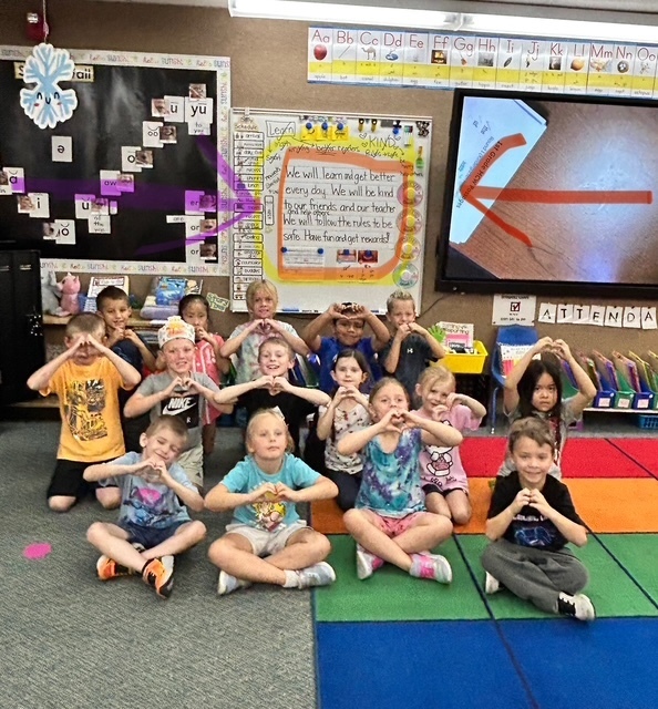 Mrs. Bolton's class with their mission statement.