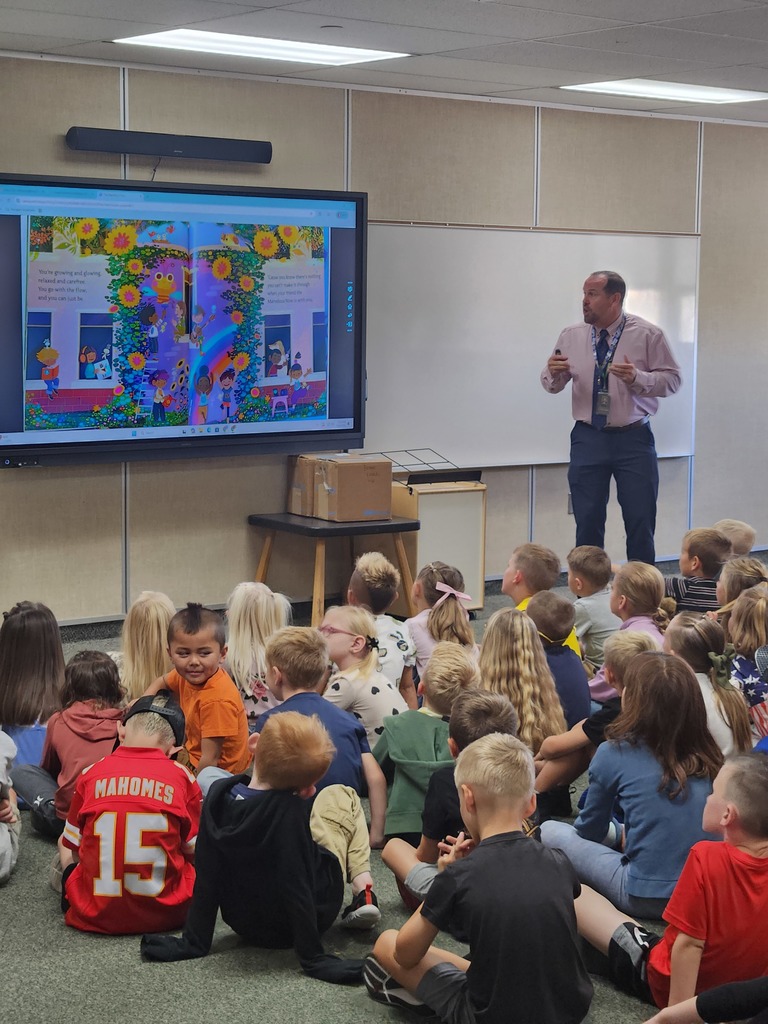Students being read to.