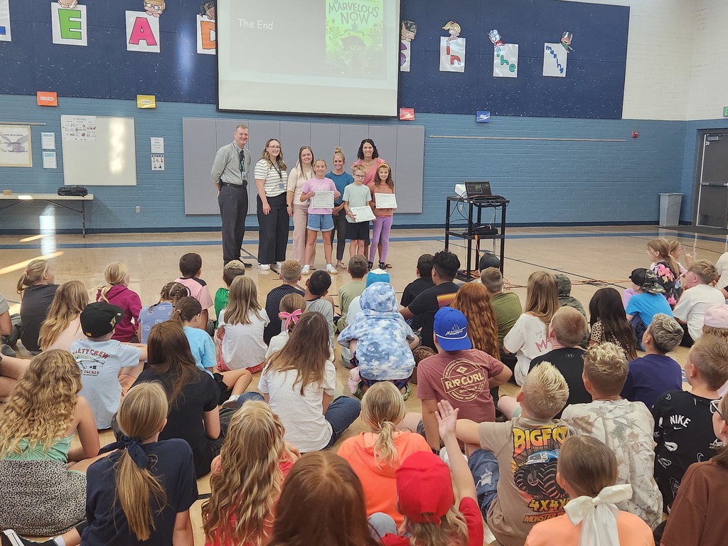 Students being read to.