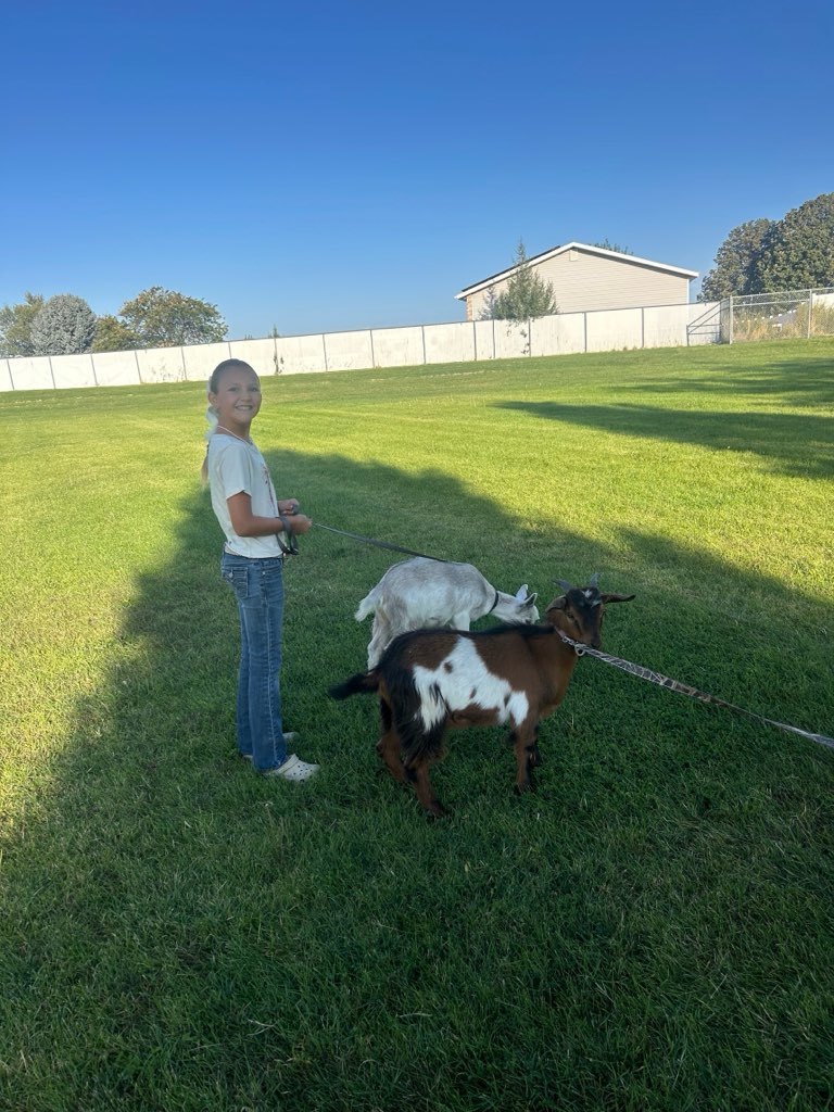 Students with goats