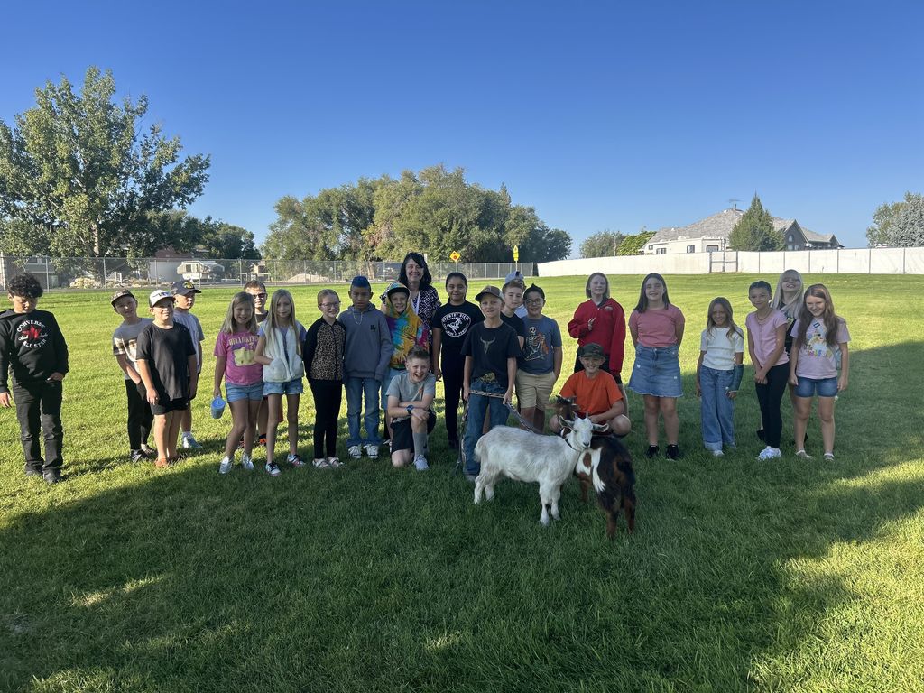 Students with goats