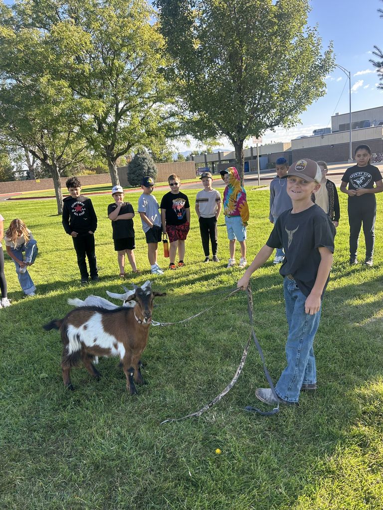 Students with goats