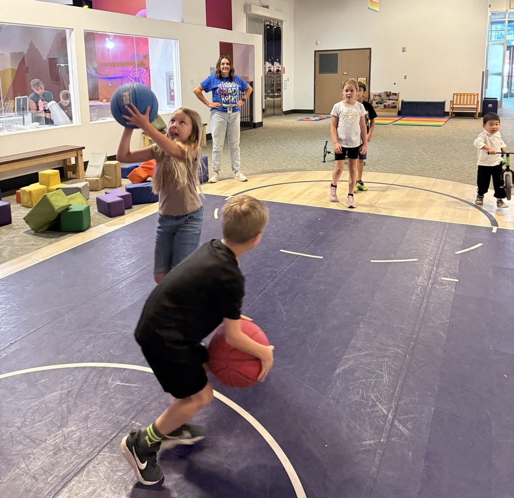 Students play at children's museum. 