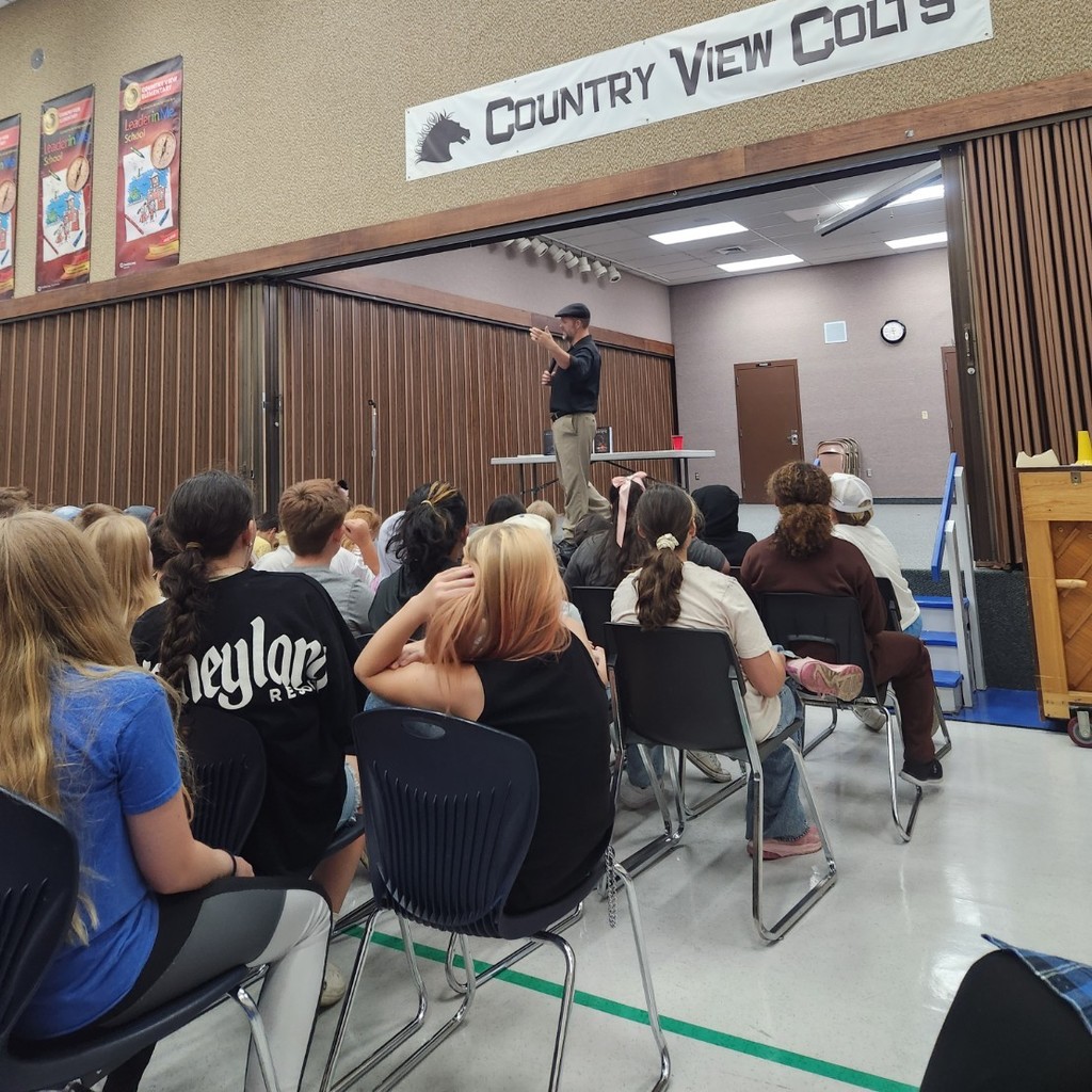 Lance Conrad with students