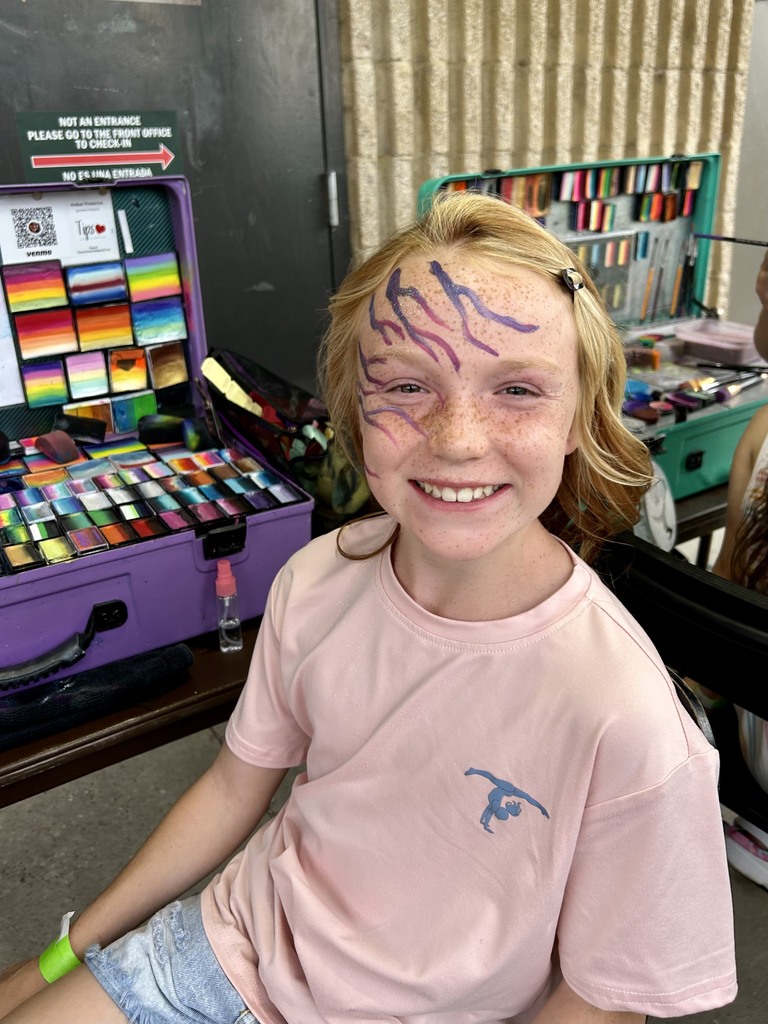 Student getting face painted