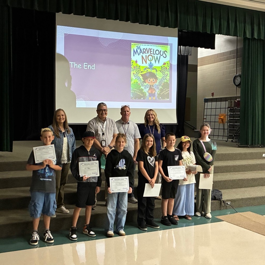 6th grade students ts and teachers with award certificates