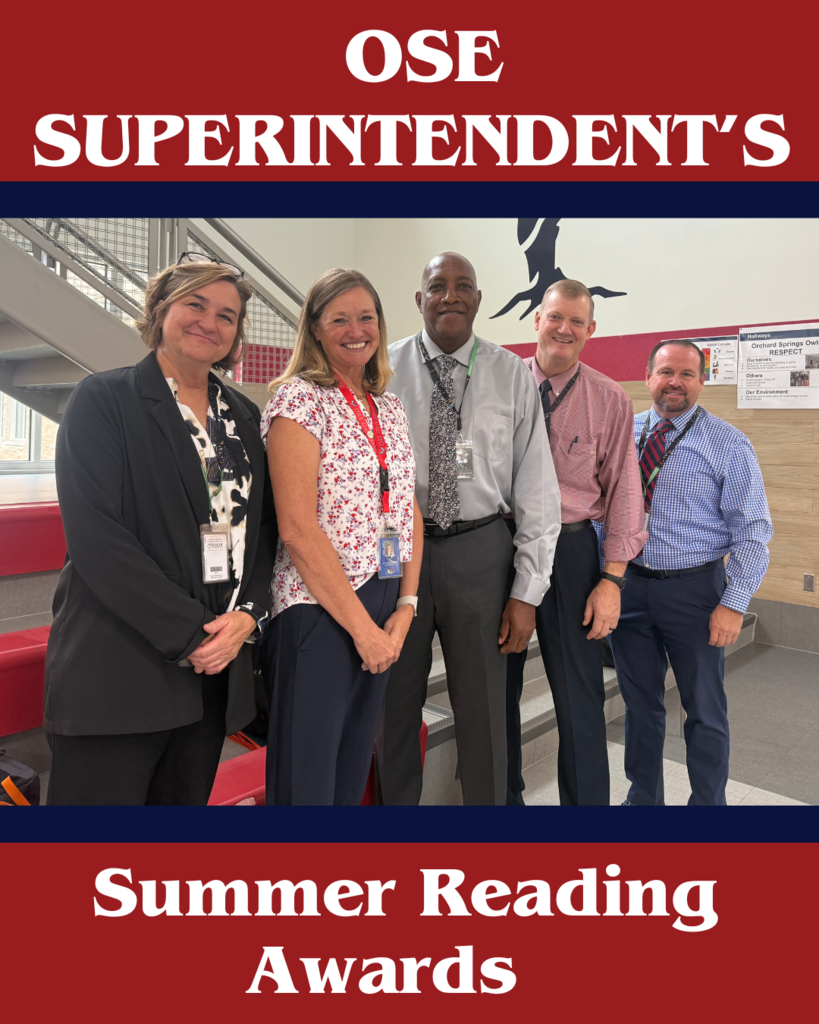 Superintendent and district leaders visiting OSE to celelbebrate reading. Blue and red formating with the title Superintenden'ts Summer Reading Awards. 