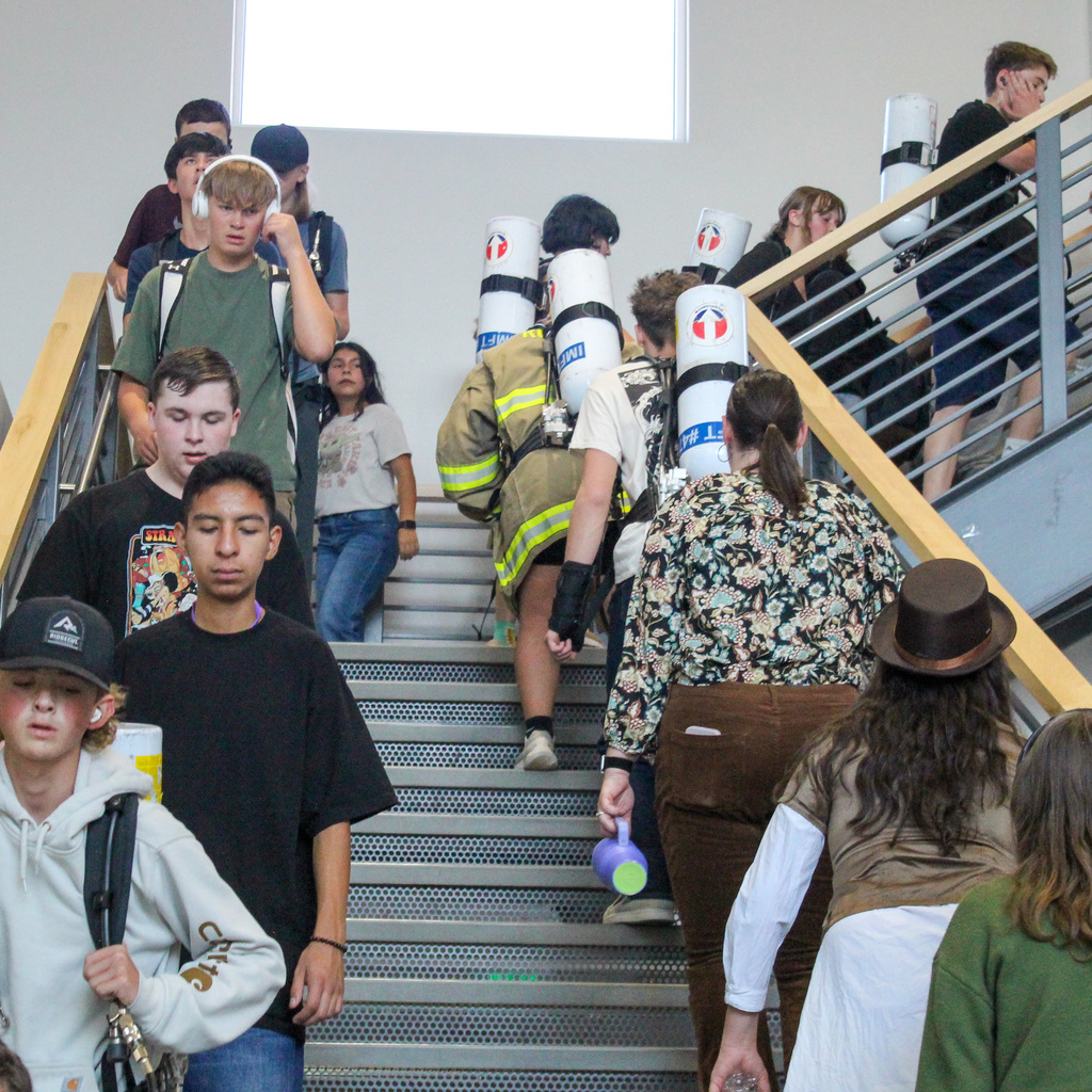 students walking stairs in remembrance of 911