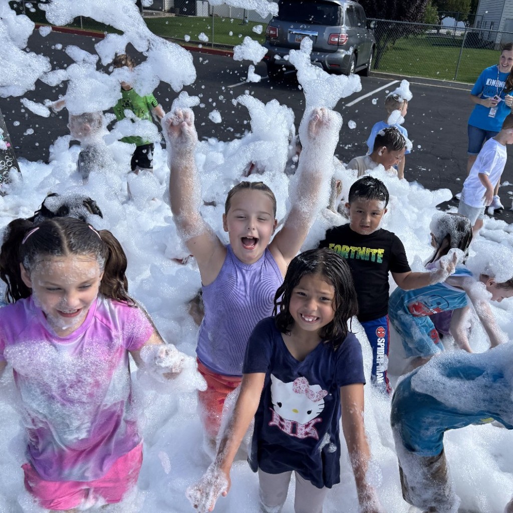 Kids playing in suds