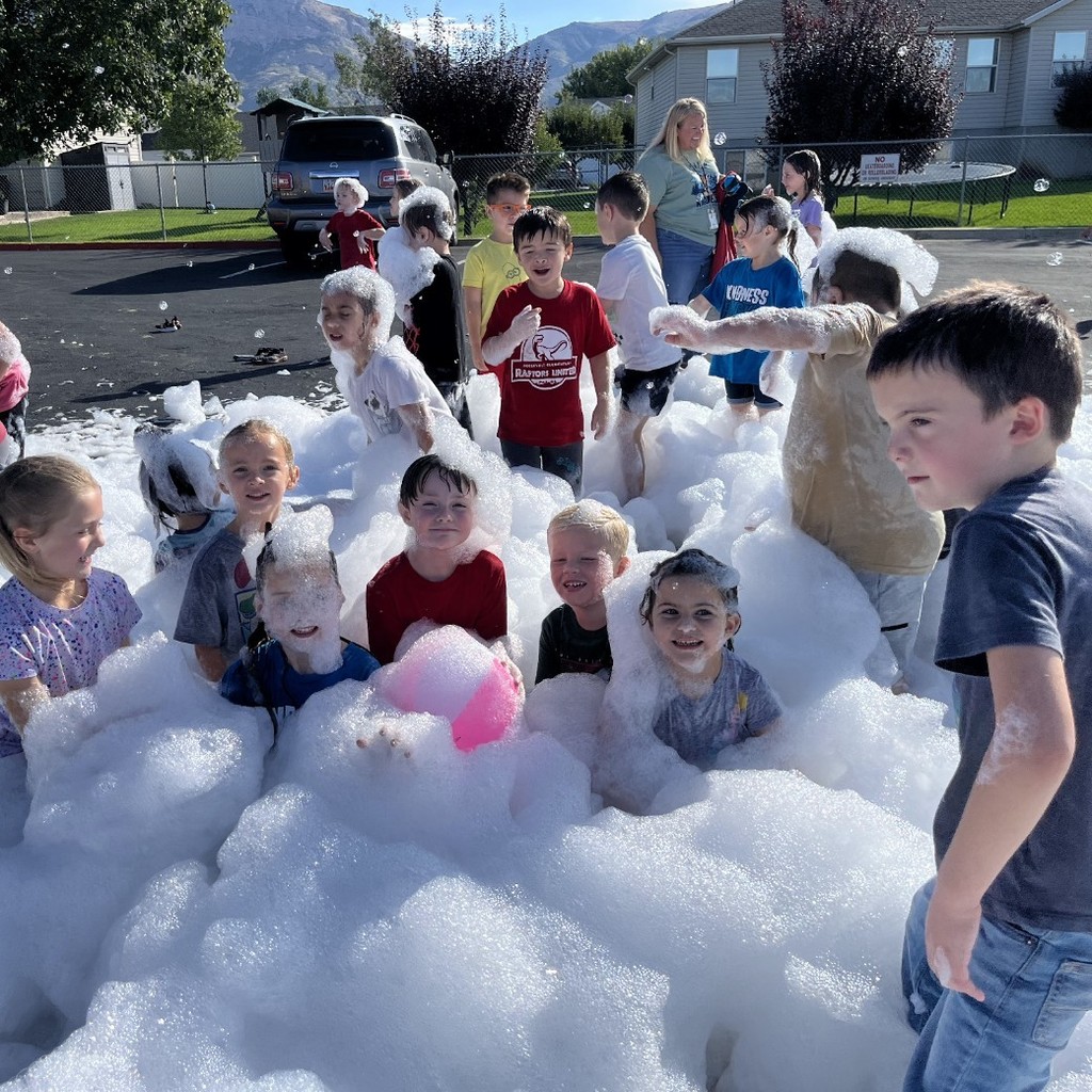 Kids playing in suds