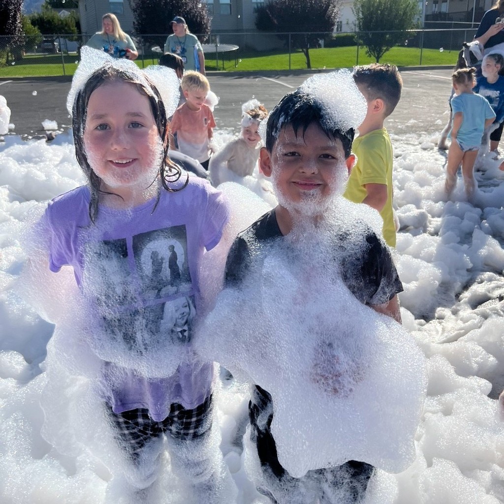 Kids playing in suds