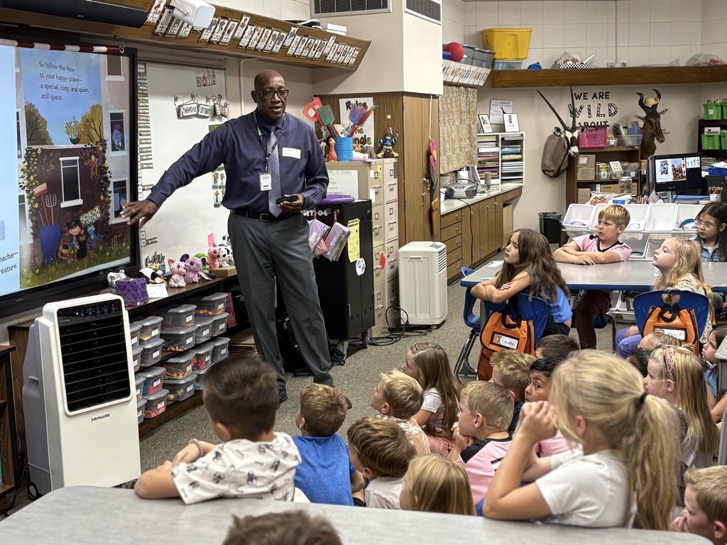 District Leader sharing story to a group of students