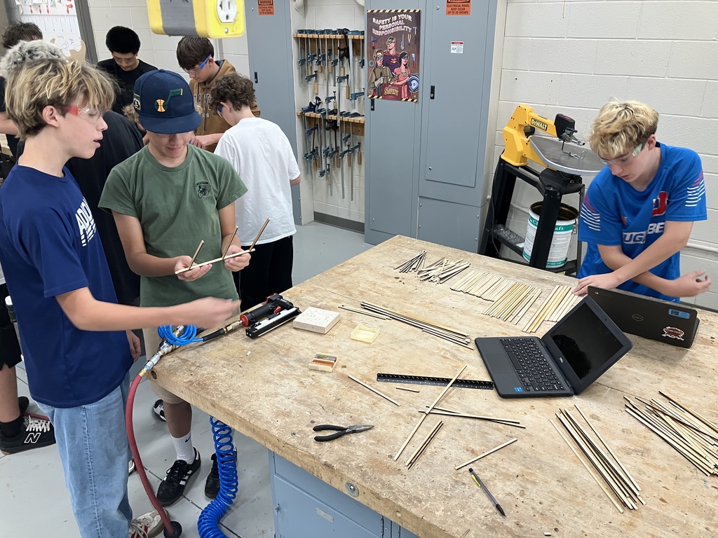 9th Grade Construction Tech class has been learning how to read blueprints and the basic components of a wall and roof. As they now try to apply this knowledge into a scale model of a shed. 