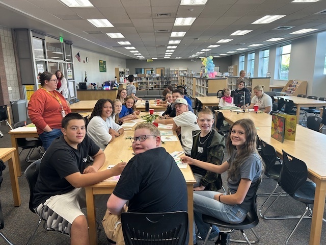 Peer tutors and the Life Skills Students in the media center 